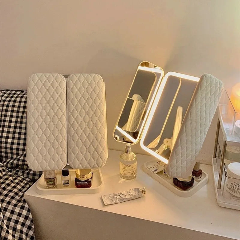 Two LED light-up VeloGleam Lighted Makeup Mirror on a table with skincare products.