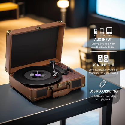 Brown suitcase-style VinyyLux Record Player on a table with features highlighted.