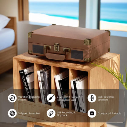 VinyyLux Record Player suitcase on a wooden table with books and a plant, set against a bedroom background.