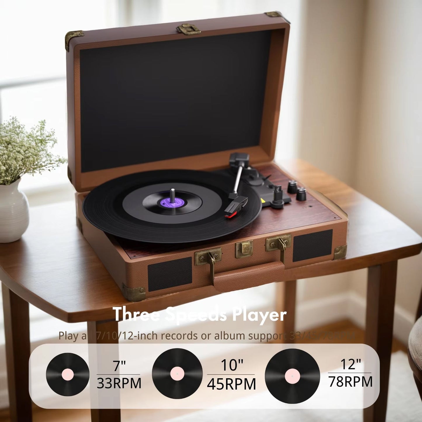 Wooden VinyyLux Record Player on a table with a blurred background