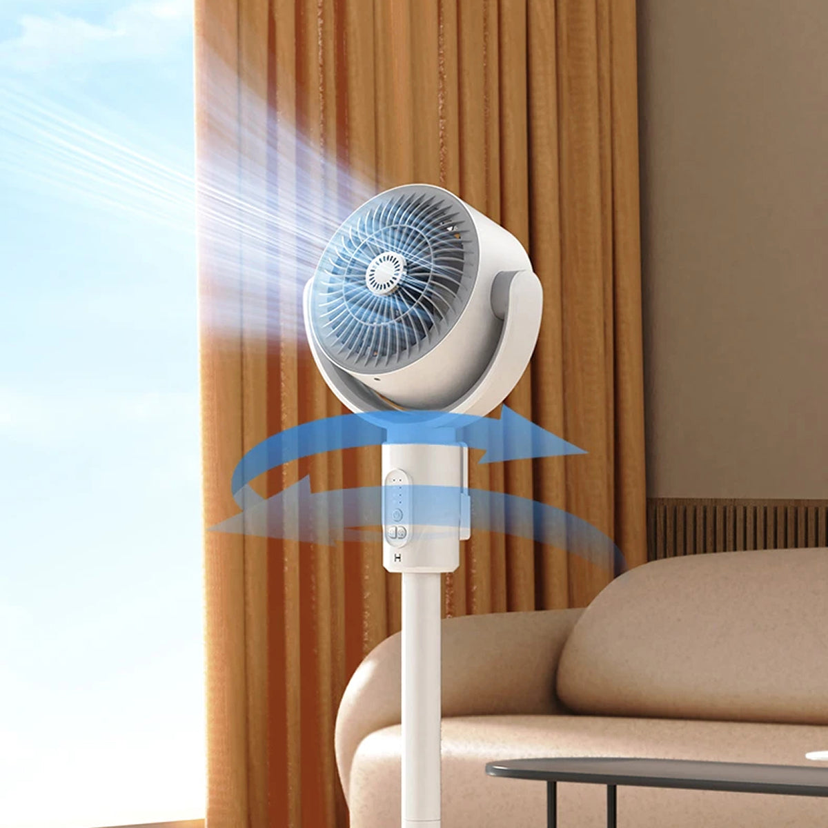 White pedestal VortixVex Fan in a living room with brown curtains and sofa.