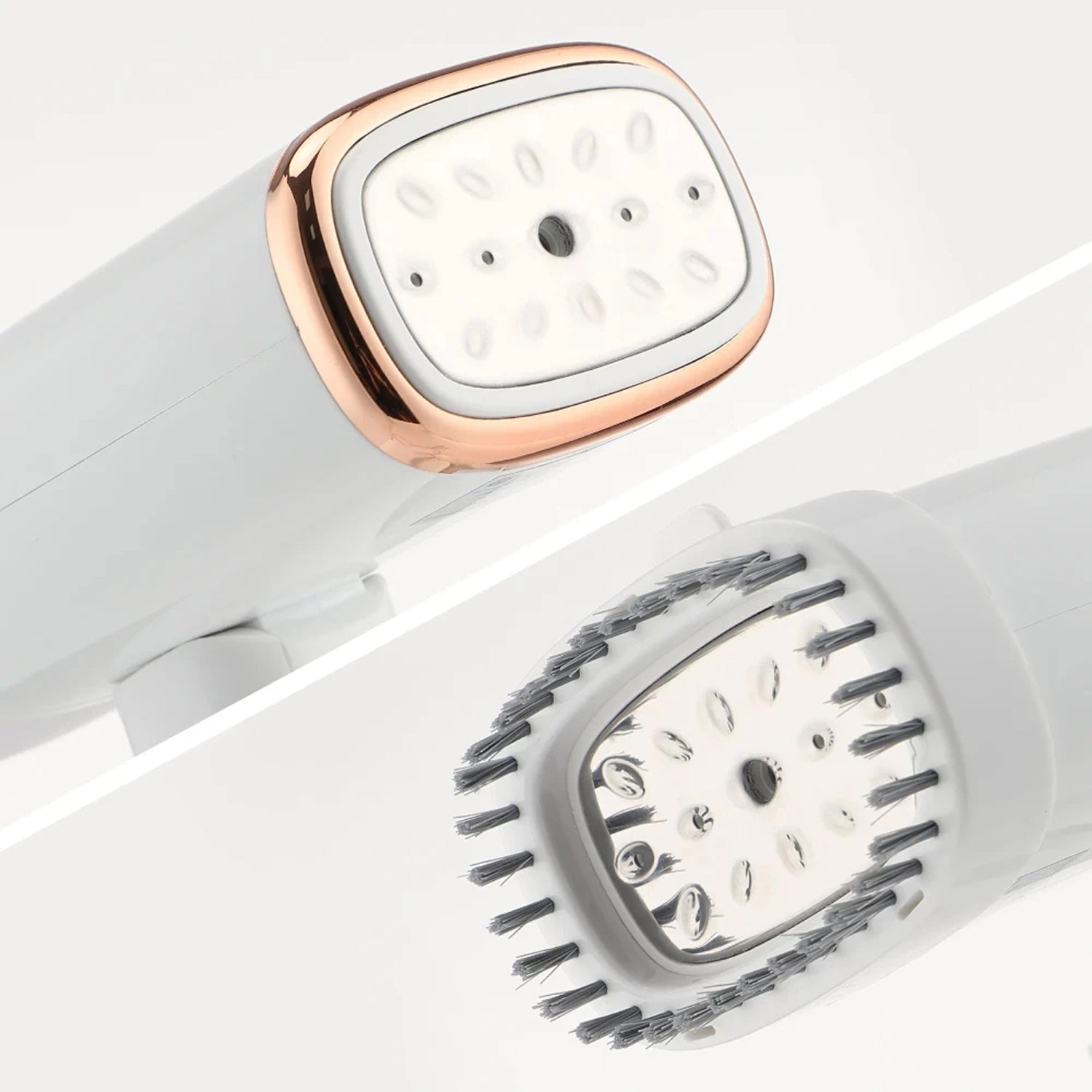 Two WandixStim Steamer with white faces and rose gold and black accents on a light gray background