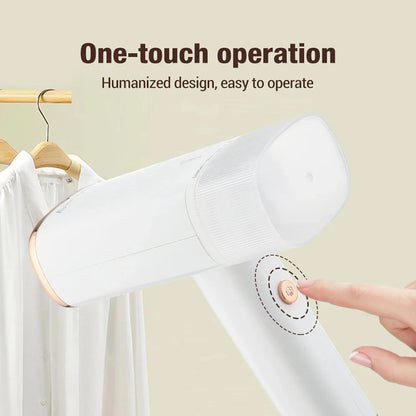 White WandixStim Steamer with one-touch operation feature on a beige background