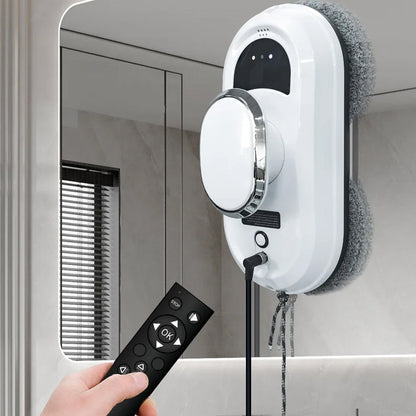 WiniGlide Robot Window Cleaner with remote control attached to a mirror