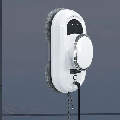 White WinoBotto Robot Window Cleaner with a cord on a dark gray background