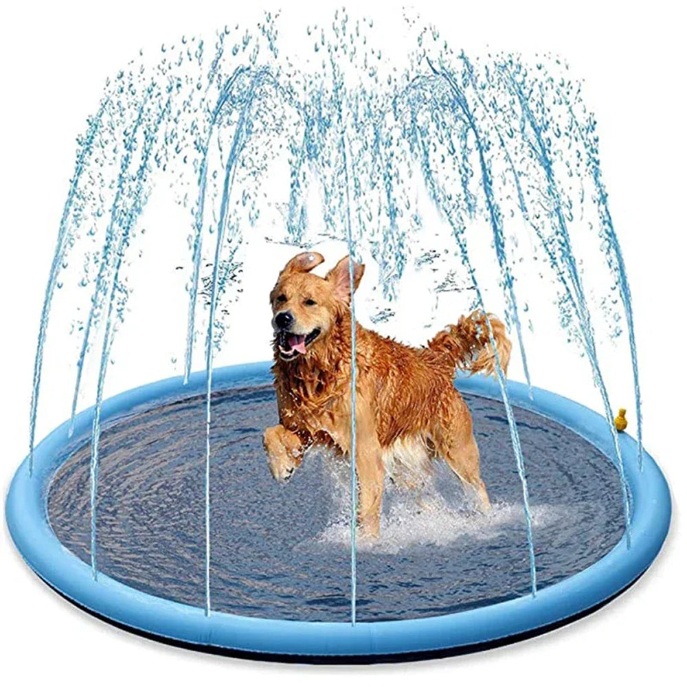 Dog playing in a blue inflatable sprinkler pad with water splashes.