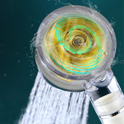 Close-up of a Zenvora LED Handheld Shower spraying water, with a glowing green and yellow spiral graphic overlaid on the spray head against a dark teal background.