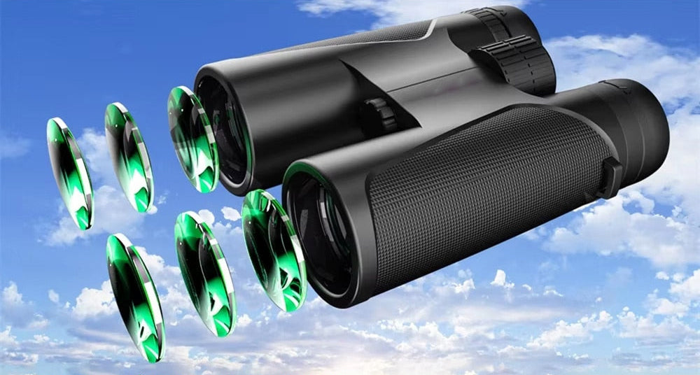 Black BixCelix Binocular with green lenses against a blue sky background