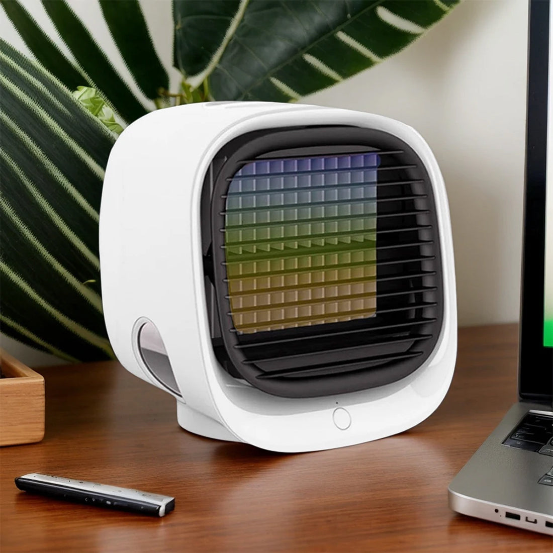 Coolevax Portable Air Conditioner on a desk with a laptop and remote control in the background