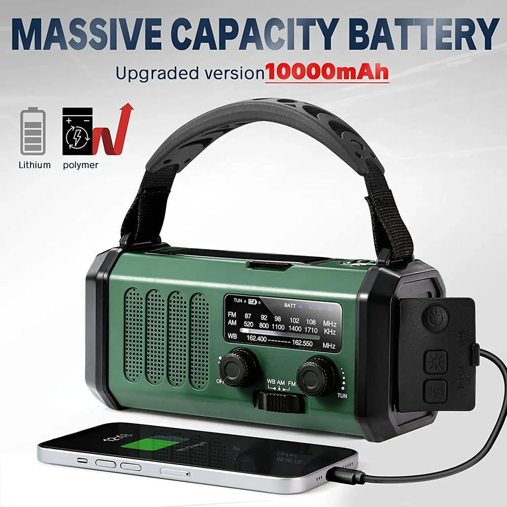 Green portable crankoax radio with charging cable on a white background, emphasizing its massive capacity battery.
