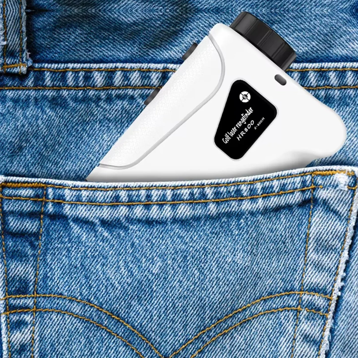 White Klarity Golf Rangefinder device with black label on blue denim fabric